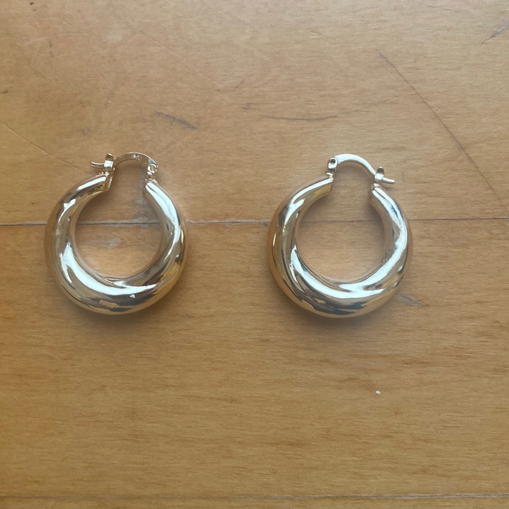 Lisa says gah twisted gold plated hoop earrings